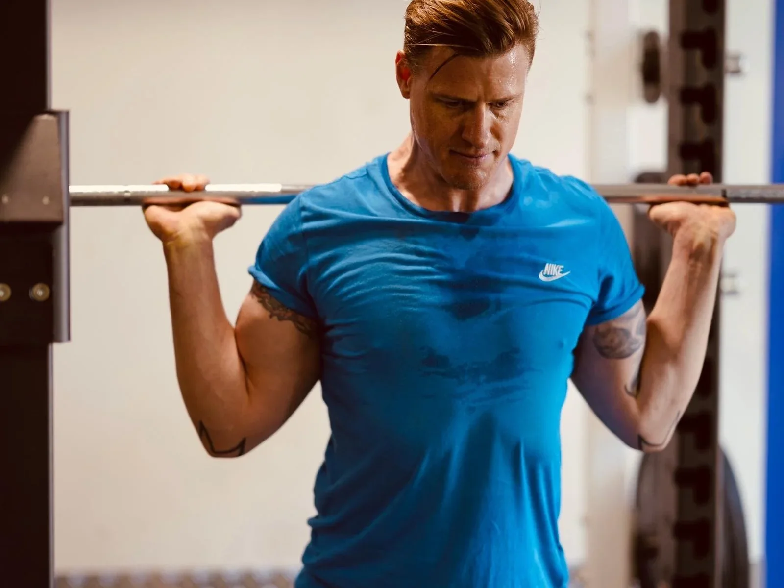 Terry Fairclough, personal trainer in Golders Green, strength training with a barbell